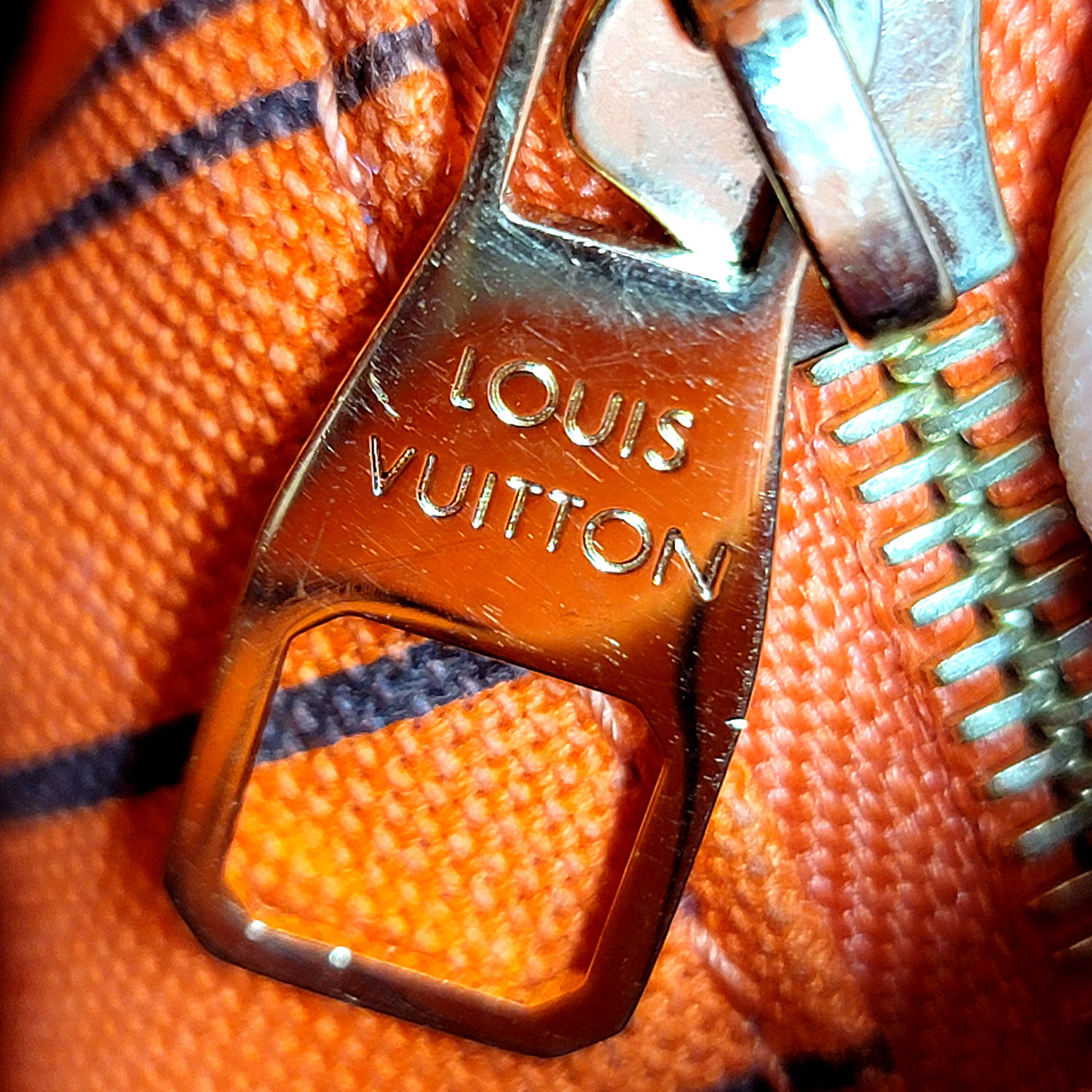 LOUIS VUITTON Orange Monogram Empreinte Leather Bagatelle