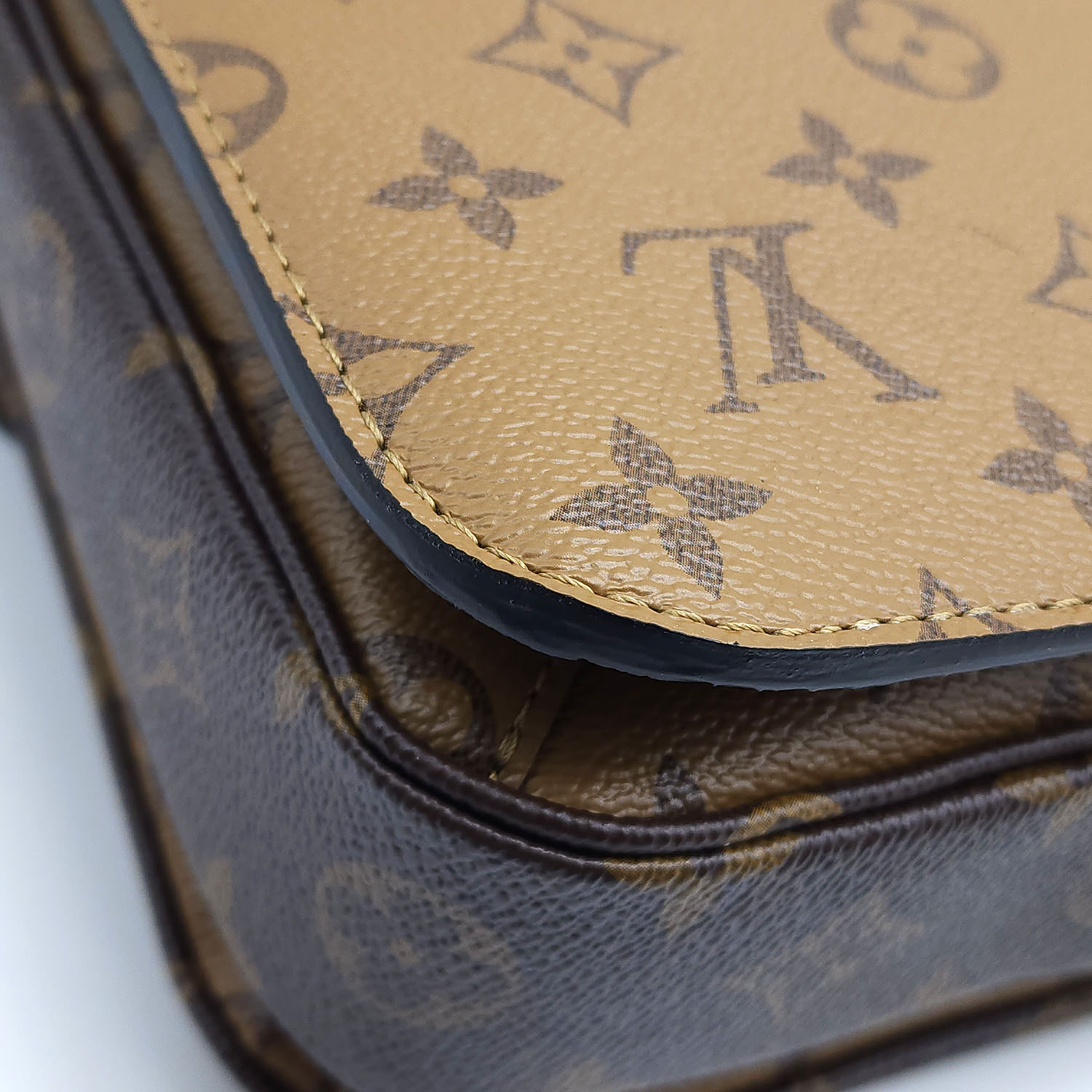 Louis Vuitton Pochette Métis Mini in Shiny Epi Noir & Monogram Reverse -  SOLD